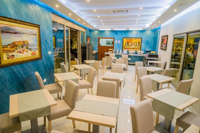 Imagen del bar/restaurante del Hotel Butua Residence. Foto 3