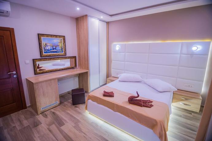 Imagen de la habitación del Hotel Butua Residence. Foto 8