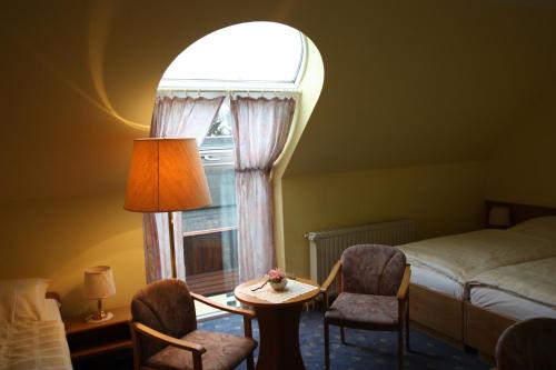 Imagen de la habitación del Hotel B&uuml;rgerhof, Hohenstein-Ernstthal. Foto 6