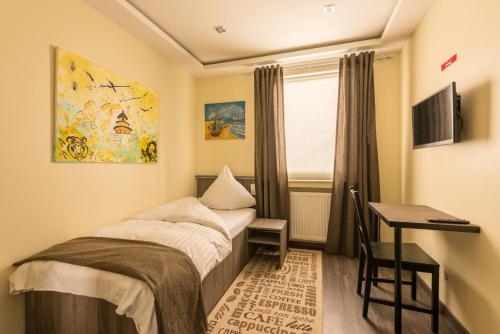 Imagen de la habitación del Hotel B&uuml;rgerhofhotel. Foto 8