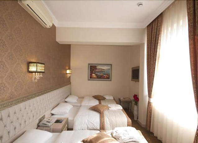 Imagen de la habitación del Hotel B&uuml;y&uuml;k Truva Oteli. Foto 3