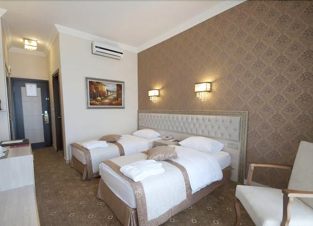 Imagen de la habitación del Hotel B&uuml;y&uuml;k Truva Oteli. Foto 8