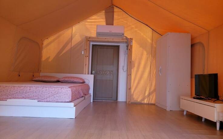 Imagen de la habitación del Hotel Buye Glamping Pan. Foto 13