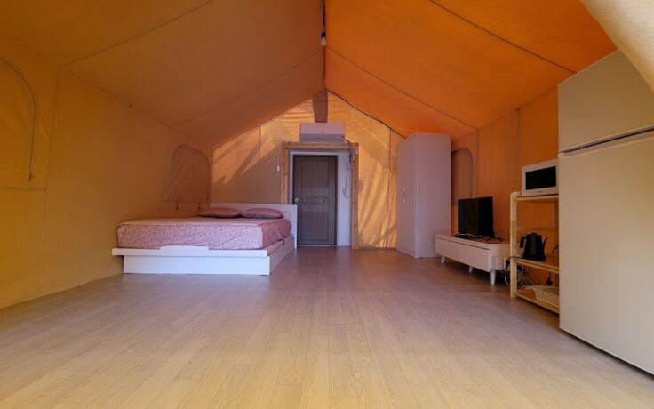 Imagen de la habitación del Hotel Buye Glamping Pan. Foto 14