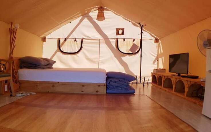 Imagen de la habitación del Hotel Buye Glamping Pan. Foto 18