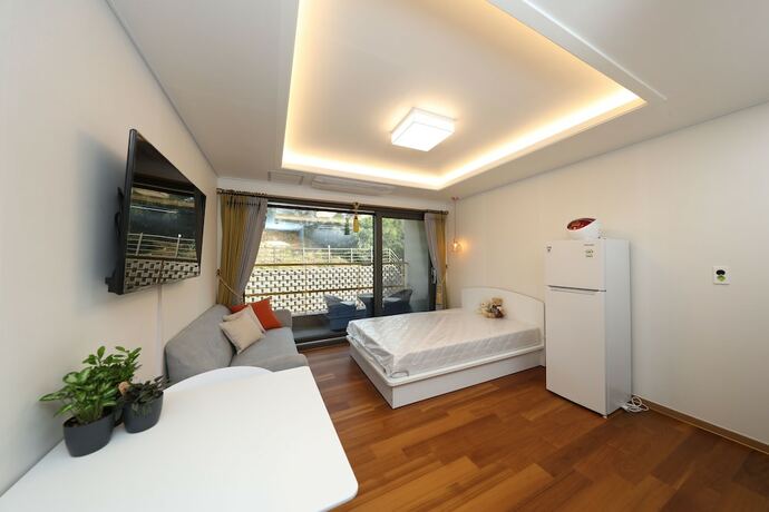Imagen de la habitación del Hotel Buyeo Park Art Villas. Foto 19