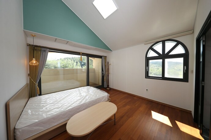Imagen de la habitación del Hotel Buyeo Park Art Villas. Foto 24