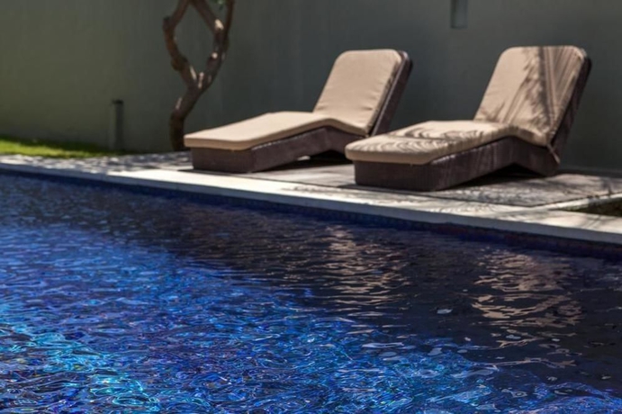 Imagen de la piscina del Hotel Bvilla Seminyak. Foto 10