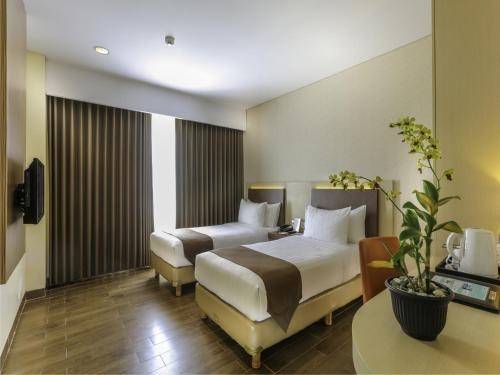 Imagen de la habitación del Hotel Bw Suite Belitung. Foto 6