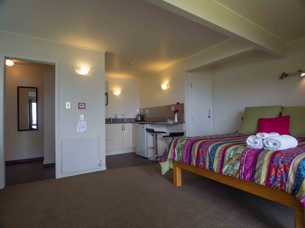 Imagen de la habitación del Hotel By The Bay Beachfront Apartments. Foto 15