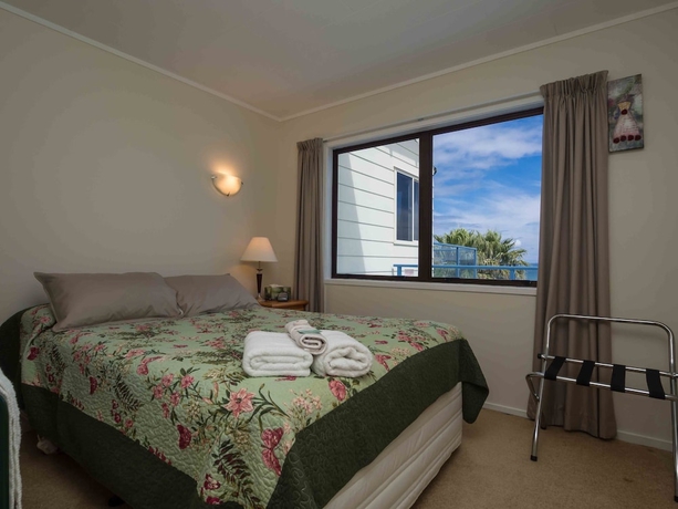 Imagen de la habitación del Hotel By The Bay Beachfront Apartments. Foto 16