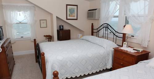 Imagen de la habitación del Hotel By The Sea Guests Bed and Breakfast and Suites. Foto 6