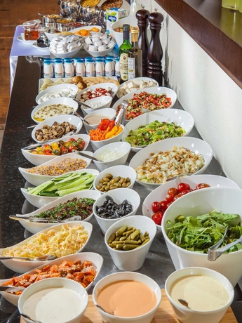 Imagen del bar/restaurante del Hotel By14 Tlv. Foto 3