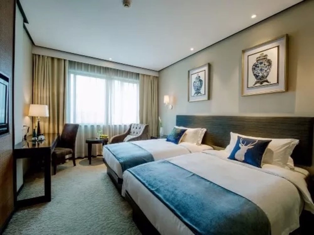 Imagen de la habitación del Hotel Byland World Yiwu. Foto 5