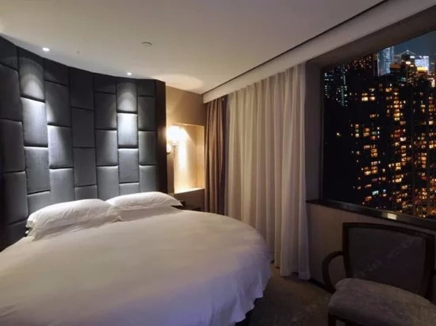 Imagen de la habitación del Hotel Byland World Yiwu. Foto 10