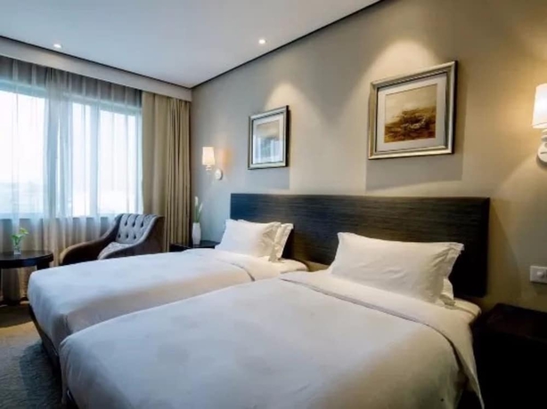Imagen de la habitación del Hotel Byland World Yiwu. Foto 11