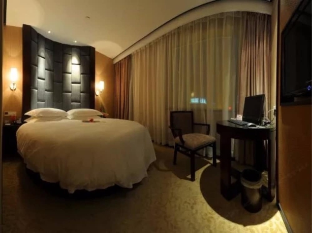 Imagen de la habitación del Hotel Byland World Yiwu. Foto 13