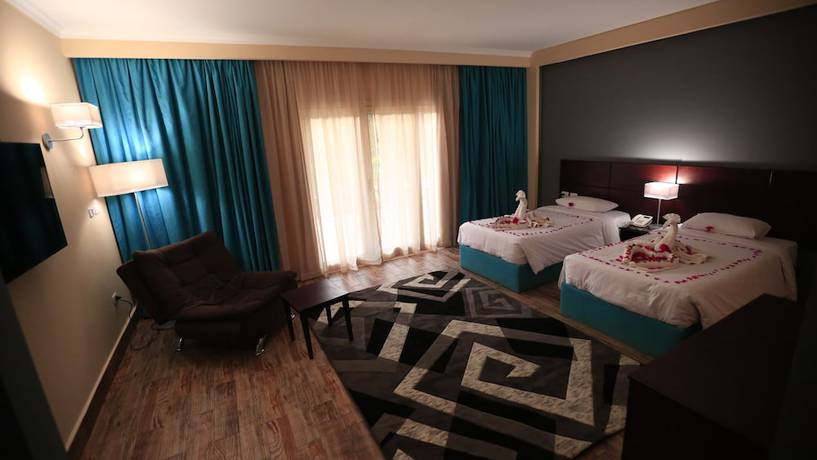 Imagen de la habitación del Hotel Byoot Bay and Resort. Foto 2