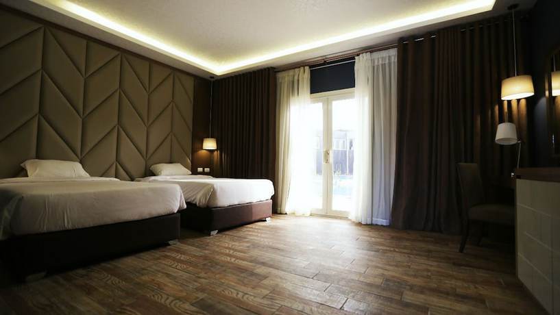 Imagen de la habitación del Hotel Byoot Bay and Resort. Foto 14
