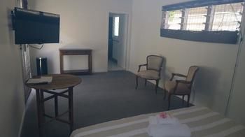 Imagen de la habitación del Hotel Byron Palms Guesthouse. Foto 11