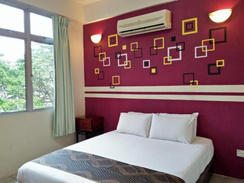 Imagen de la habitación del Hotel C, Jitra. Foto 6