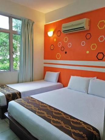 Imagen de la habitación del Hotel C, Jitra. Foto 8
