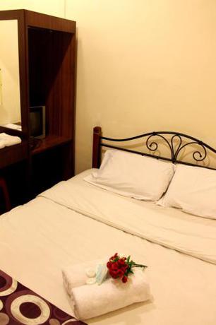 Imagen de la habitación del Hotel C, Jitra. Foto 9