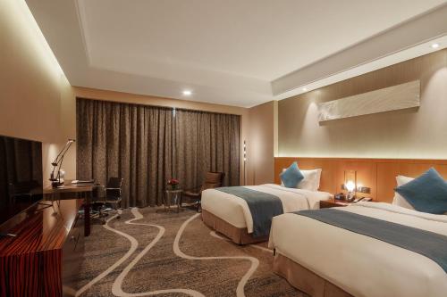 Imagen de la habitación del Hotel C Plaza Hotel. Foto 4