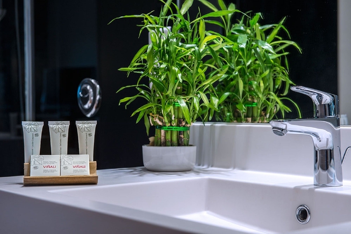 Imagen de la habitación del Hotel C Suites. Foto 12