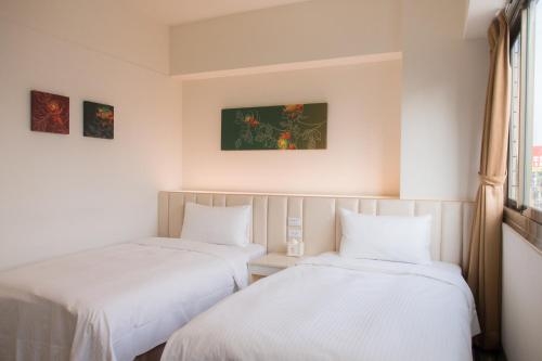 Imagen de la habitación del Hotel C U Taichung. Foto 7