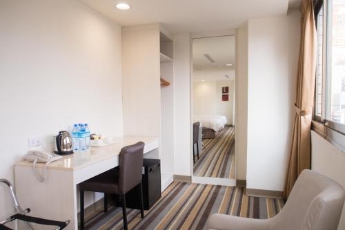Imagen de la habitación del Hotel C U Taichung. Foto 9