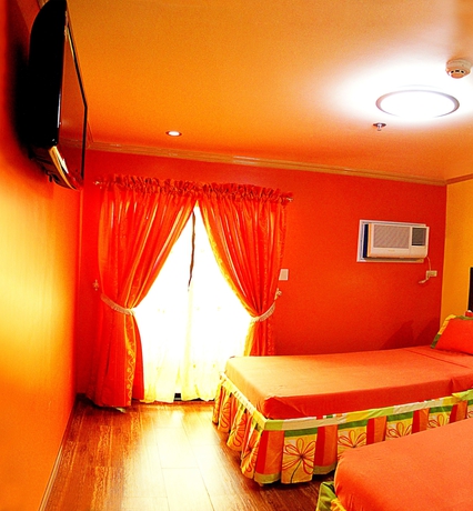 Imagen de la habitación del Hotel C and L Bay View Inn. Foto 4