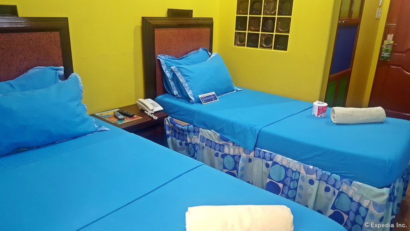 Imagen de la habitación del Hotel C and L Bay View Inn. Foto 10