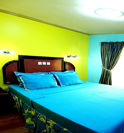 Imagen de la habitación del Hotel C and L Bay View Inn. Foto 12