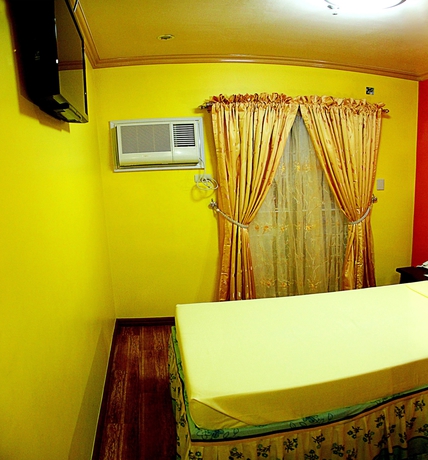 Imagen de la habitación del Hotel C and L Bay View Inn. Foto 13