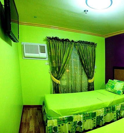 Imagen de la habitación del Hotel C and L Bay View Inn. Foto 14