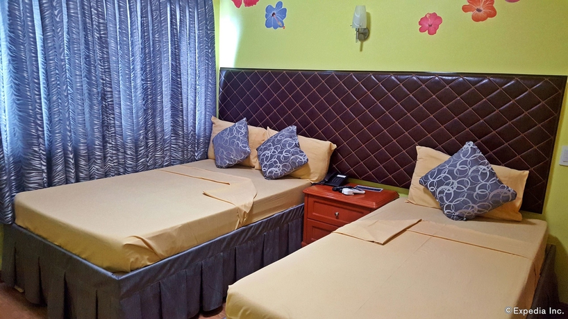 Imagen de la habitación del Hotel C and L Suites Inn. Foto 7