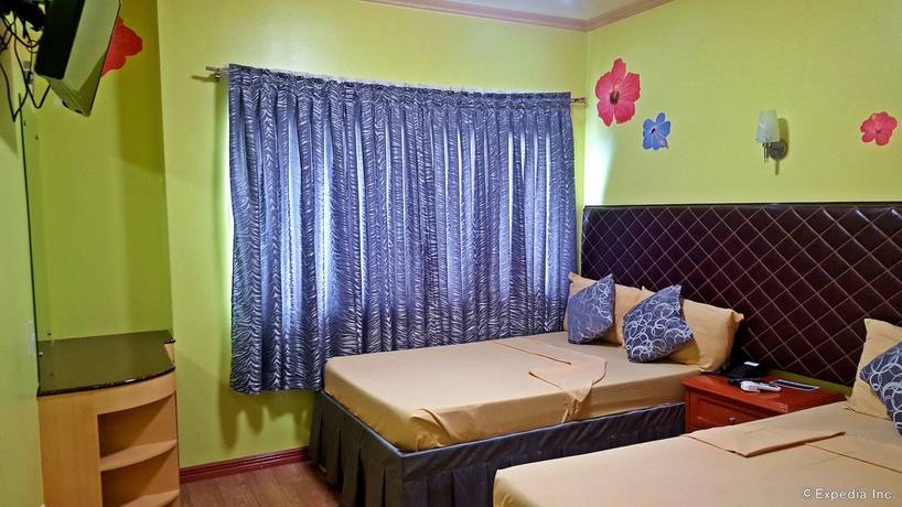 Imagen de la habitación del Hotel C and L Suites Inn. Foto 8