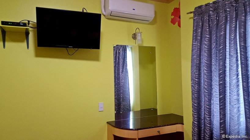 Imagen de la habitación del Hotel C and L Suites Inn. Foto 9