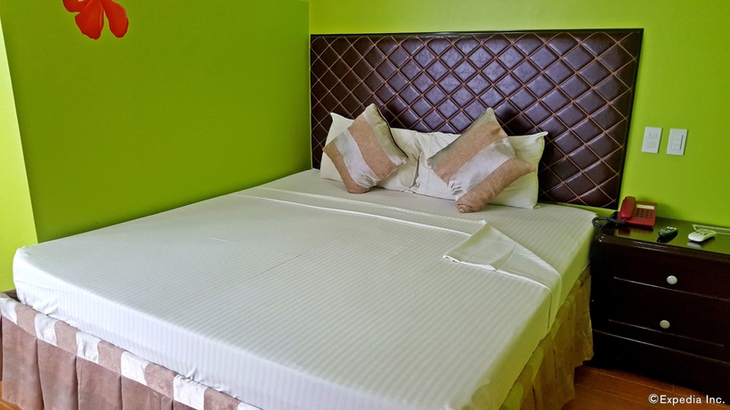 Imagen de la habitación del Hotel C and L Suites Inn. Foto 10