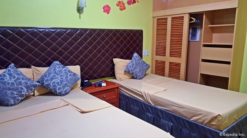 Imagen de la habitación del Hotel C and L Suites Inn. Foto 11