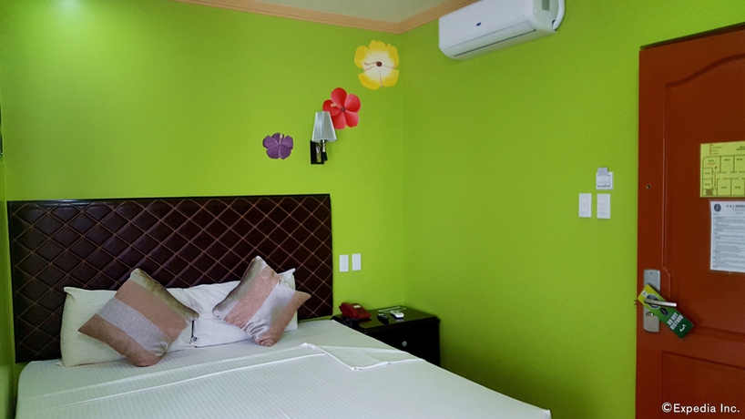 Imagen de la habitación del Hotel C and L Suites Inn. Foto 12