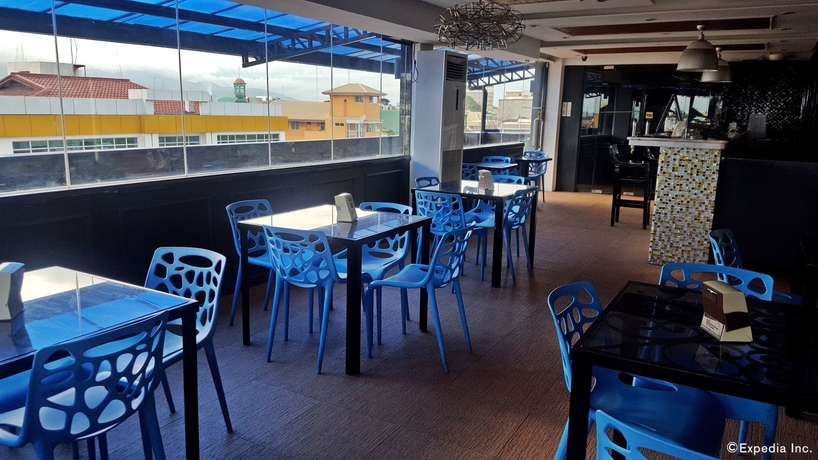 Imagen del bar/restaurante del Hotel C and L Suites Inn. Foto 5