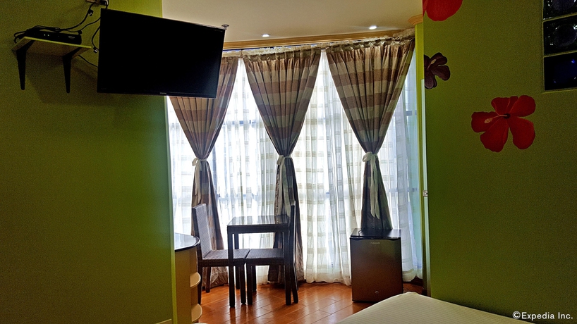 Imagen de la habitación del Hotel C and L Suites Inn. Foto 18