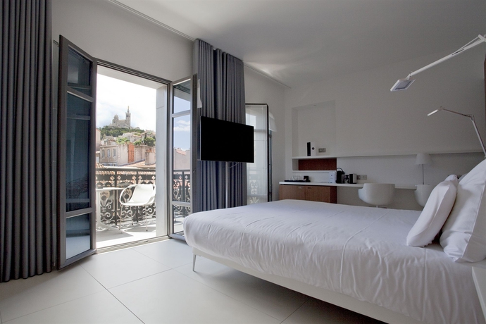 Imagen de la habitación del Hotel C2. Foto 7