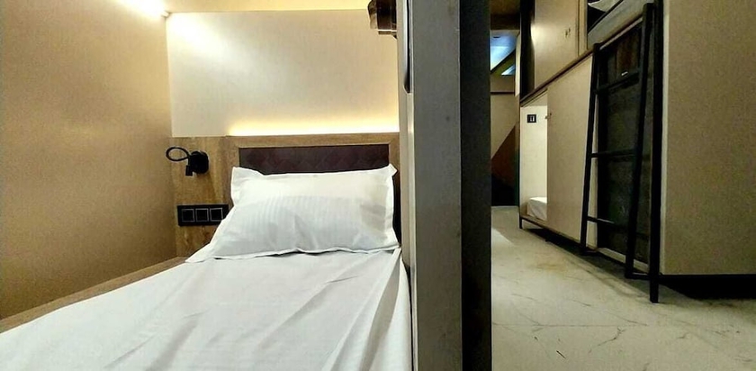 Imagen de la habitación del Hotel C2 PODS. Foto 7