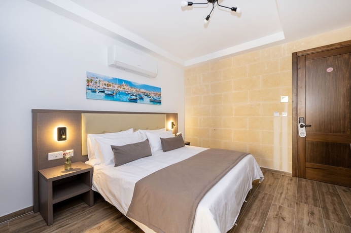 Imagen de la habitación del Hotel C4 Retreats Gozo. Foto 5