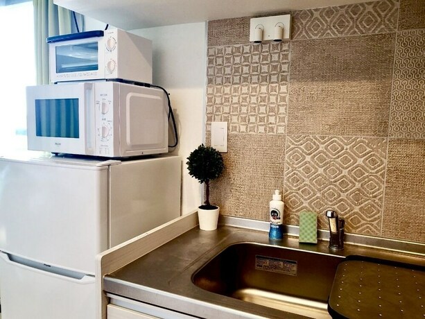 Imagen de la habitación del Hotel C7 Haneda Maison Philippe Omori 703. Foto 21