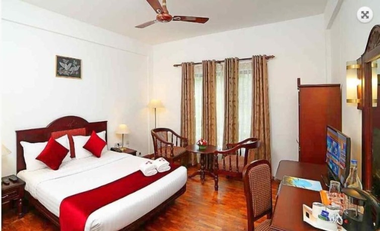 Imagen de la habitación del Hotel C7 Munnar. Foto 18
