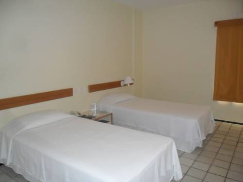 Imagen de la habitación del Hotel CALHAU PRAIA. Foto 10